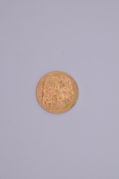 null A gold coin of 1 sovereign Edward VI (1902).

Weight : 7.99 g - VG.
