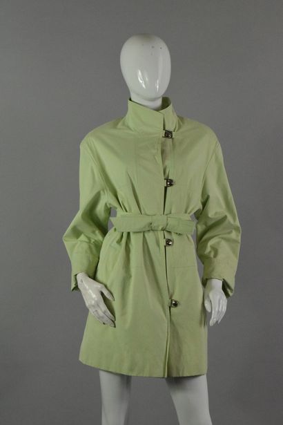 ARIELLE 

Pastel green trench coat with offset...