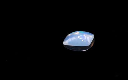 null Rectangular white cabochon opal on paper. 
Weight: 1.32 ct. 

Dimensions: 10.5mm...