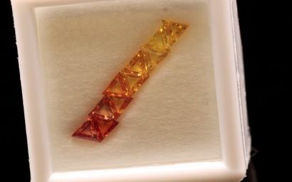 A mixture of ten red to yellow sapphires...