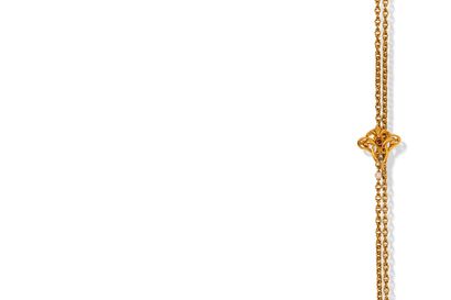null Double watch chain in 18K (750) gold, embellished with an 18K gold loop depicting...