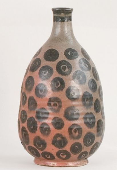 Emile LENOBLE Vase pansu à long col, vers 1925 - 1930. Décor de rondelles peintes...