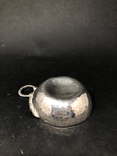 null DESPRES Jean (1889-1980)
Hammered silver wine jug, snake-shaped grip. 
Signed...