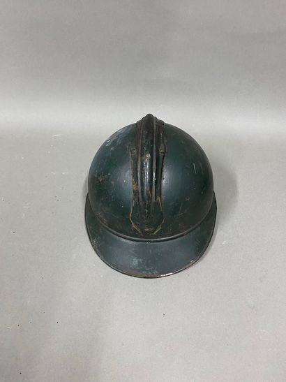 null Set of 8 helmets including : 

- Troop helmet, model 1915. 
With cockade and...