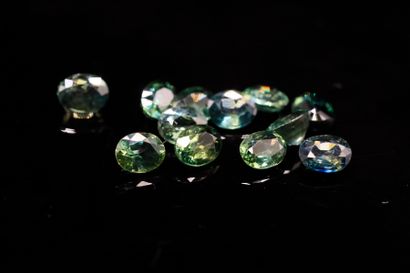 Mix of twelve oval blue and green sapphires...