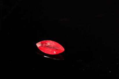 Orange-red sapphire on paper.

Weight: 0.53...