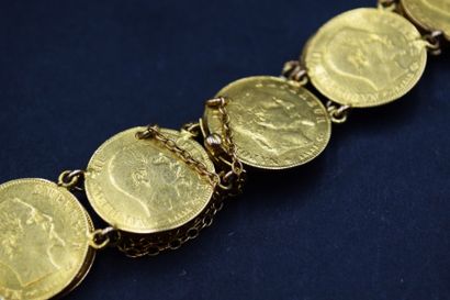 Bracelet en or jaune 18k (750) formé de 11...