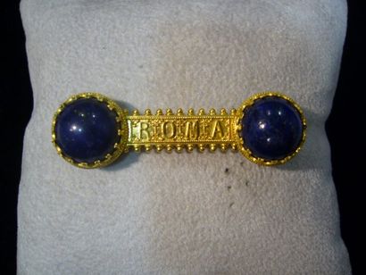null broche barrette. lapis lazuli en cabochon. inscription: "Roma". monture or jaune....