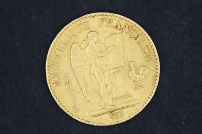null Une pièce en or de 20 francs Génie, 1877 A. Atelier : Paris.

Poids : 6,45 ...