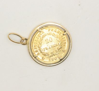 null Pièce en or 20 francs Napoléon Empereur tête laurée (1808, A) montée en pendentif.
Poids...