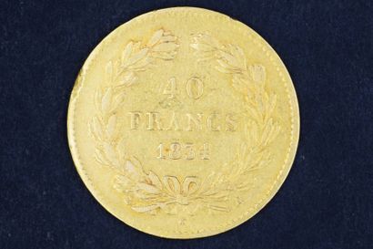 null Une pièce en or de 40 Francs Louis-Philippe - 1834 A - Atelier : Paris. 

Poids...