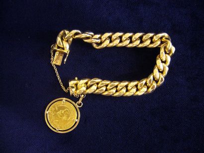 null Bracelet d'identité en or jaune orné d'une d'un Napoléon. ( accident ). Poids...