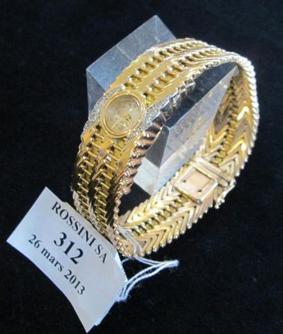 UNIVERSAL Montre bracelet de dame, ronde, en or jaune 18K (750/1000e), cinq petits...