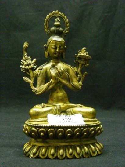 null Sujet en bronze doré représentant le dieu Manjusri assis en padmasana sur un...