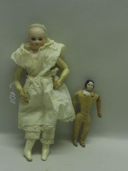 null Petite poupée de mode du XIXe siècle Tête et buste en biscuit pressé, sans marque,...