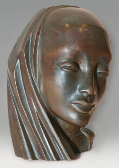 HAGENAUER Visage féminin Masque en bronze à patine brune (légers frottements et petits...