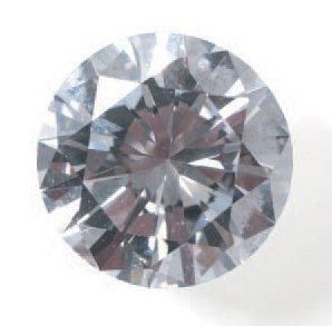 null Bague en or gris 18 K sertie d'un diamant solitaire de forme ronde et de taille...