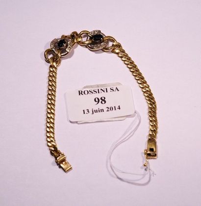 null Bracelet articulé en or jaune 585 millièmes 14 K, le centre orné de deux motifs...
