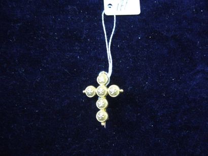 null Broche croix motif "étoile" or jaune. 19 g. (un point d'usure)