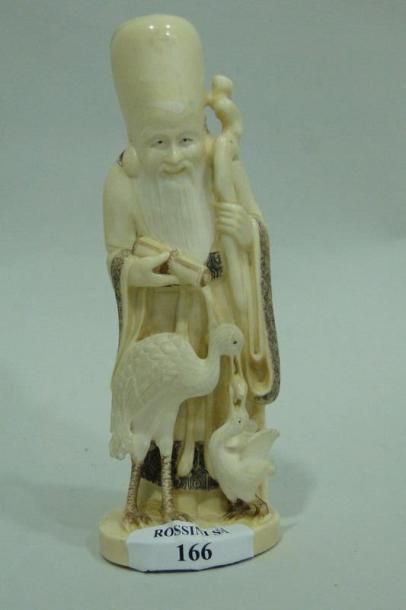 null Statue en ivoire représentant Shoulao, dieu de longévité, accompagné d'une grue...