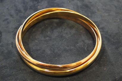 CARTIER Bracelet «Trinity» composé de trois anneaux en or de trois tons. Signé et...