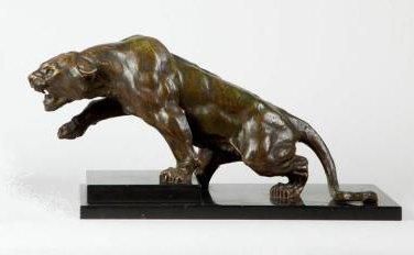 CARTIER Thomas, 1879-1943 Tigre rugissant, bronze à patine brune nuancée de vert...