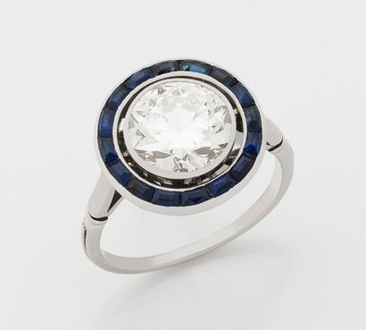 null Bague en platine centrée d'un diamant demi taille calibrant 2,90 cts environ...