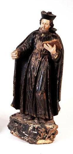 null Saint François-Xavier en bois sculpté en ronde-bosse et polychromé avec rehauts...