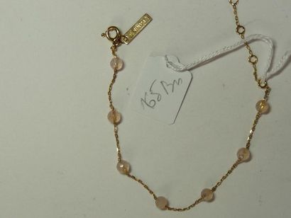 MORGANE BELLO Bracelet composé d'une chaînette d'or rose entrecoupée de boules de...
