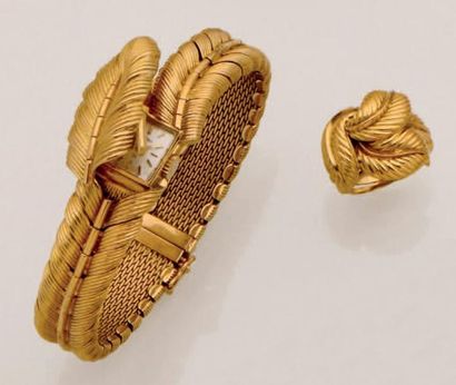 BLANCPAIN Montre bracelet de dame en or jaune articulé à motif de plume formant capot...