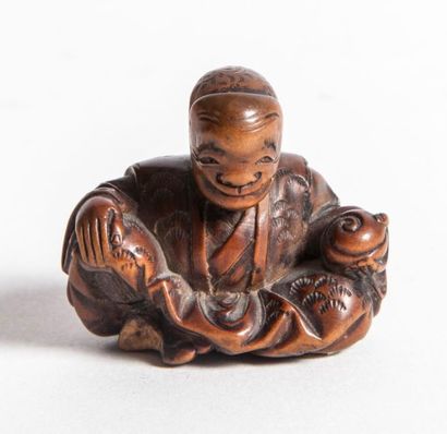 null Netsuke en bois, personnage assis Japon, Edo, XIXème siècle Hauteur 3cm (pied...