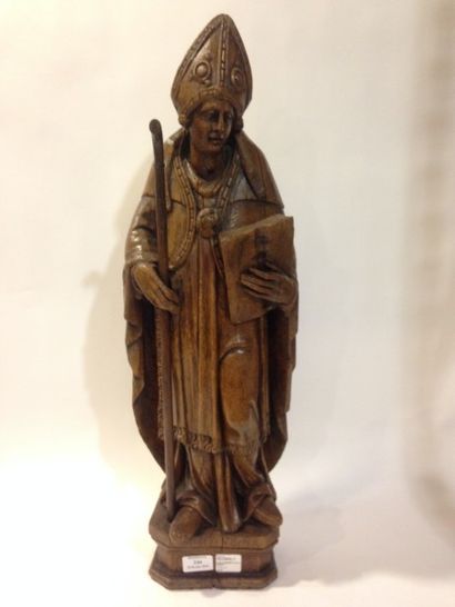 null Saint evêque en bois naturel sculpté tenant sa crosse et un livre.

XIXème siècle

Accidents...
