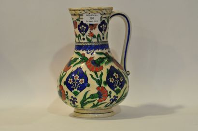 Théodore DECK (1823-1891) 
Pichet dans le goût Ottoman en céramique à décor polychrome...