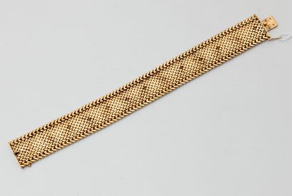 null Bracelet ruban souple en or jaune 18K (750) en maille pressée.
Longueur 19 cm...