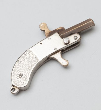 null Pistolet miniature en métal

Long : 4 cm

