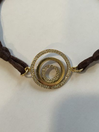 null Bracelet en or jaune 18K (750) orné de cercles imbriqués unis ou sertis de diamants...