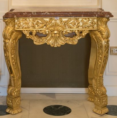 null Importante console en bois sculpté doré de style italien, dessus marbre rouge...