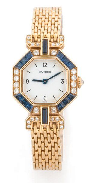 CARTIER Belle montre de dame octogonale, lunette sertie de diamants et de saphirs,...