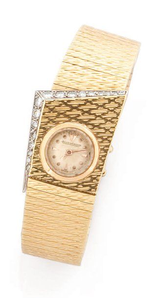 JAGER LECOULTRE Originale montre bracelet de dame or jaune encadrée sur 2 cotés de...