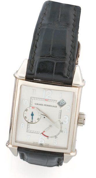 GIRARD PERREGAUX Grande montre d'homme rectangulaire galbée en or gris 18 K (750...