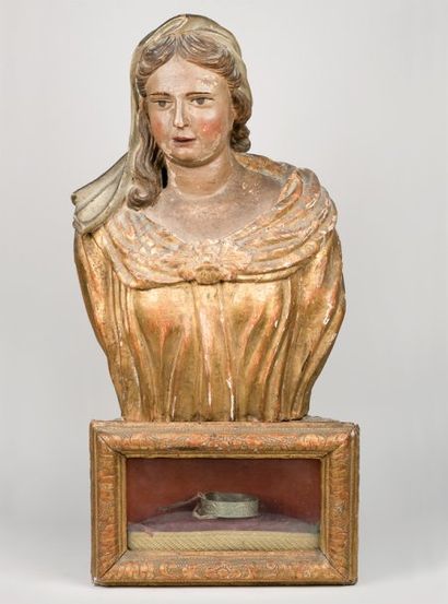 null Buste de jeune femme en bois sculpté polychrome et doré. Ce buste sans bras...