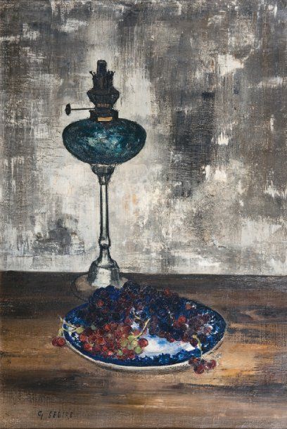 Gaston SEBIRE Assiette de raisins et lampe à pétrole Huile sur toile, signée en bas...