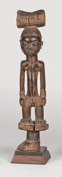 null Statue YOROUBA (Nigeria) Appartenant au culte de SHANGO, cette statuette de...