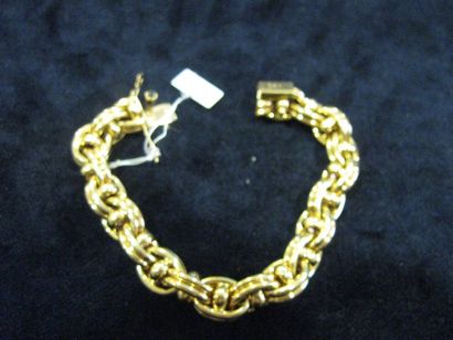 null Bracelet en or jaune formé d'une maille fantaisie (même modèle que le lot précédent)....