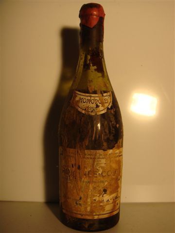 null 1B ROMANEE-CONTI (Grand Cru) 6,5 cm sur bouchon; e.t.a lisible; clm.a partiellement...