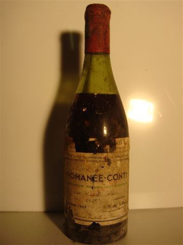 null 1B ROMANEE-CONTI (Grand Cru) 5,2 cm; e.a lisi ble; s.c.m; capsule cire abîmée...