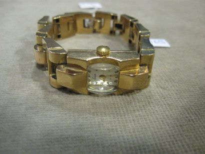Anonyme Années 50. Montre bracelet de dame " tank ". Rectangulaire en or rose 18...