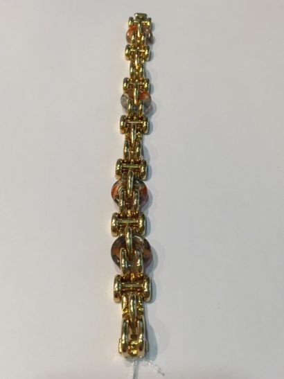 null FRED
Bracelet en or jaune 18k (750)  à mailles retenant des anneaux en jaspe.
Long....