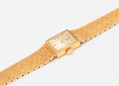 null Montre bracelet mécanique de dame à boitier rectangulaire en or jaune 18K (750)
Index...