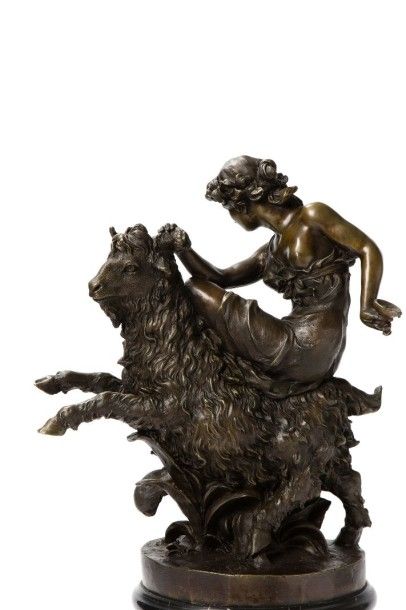 MICHEL, XXe siècle 
Bacchante chevauchant un bouc
Groupe en bronze à patine brune,...